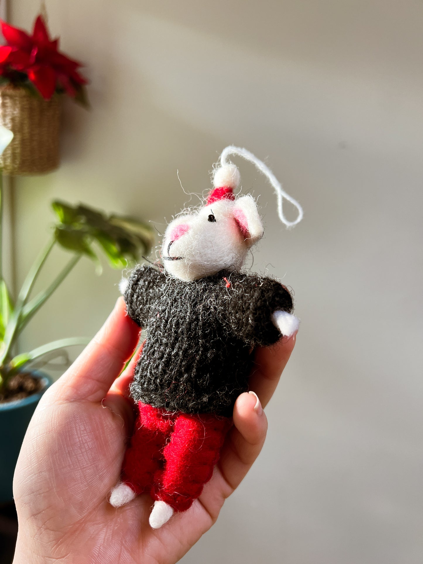 Little Mouse wears Christmas hat ornament